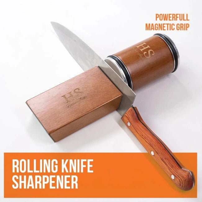 A product shot of a rolling knife sharpener with a wooden handle and cylindrical wood/body. The knife is pushed through a metal guide, creating a rolling sharpening action. The text “ROLLING KNIFE SHARPENER” appears in an orange banner at the bottom, and “POWERFUL MAGNETIC GRIP” is printed in orange at the top right.