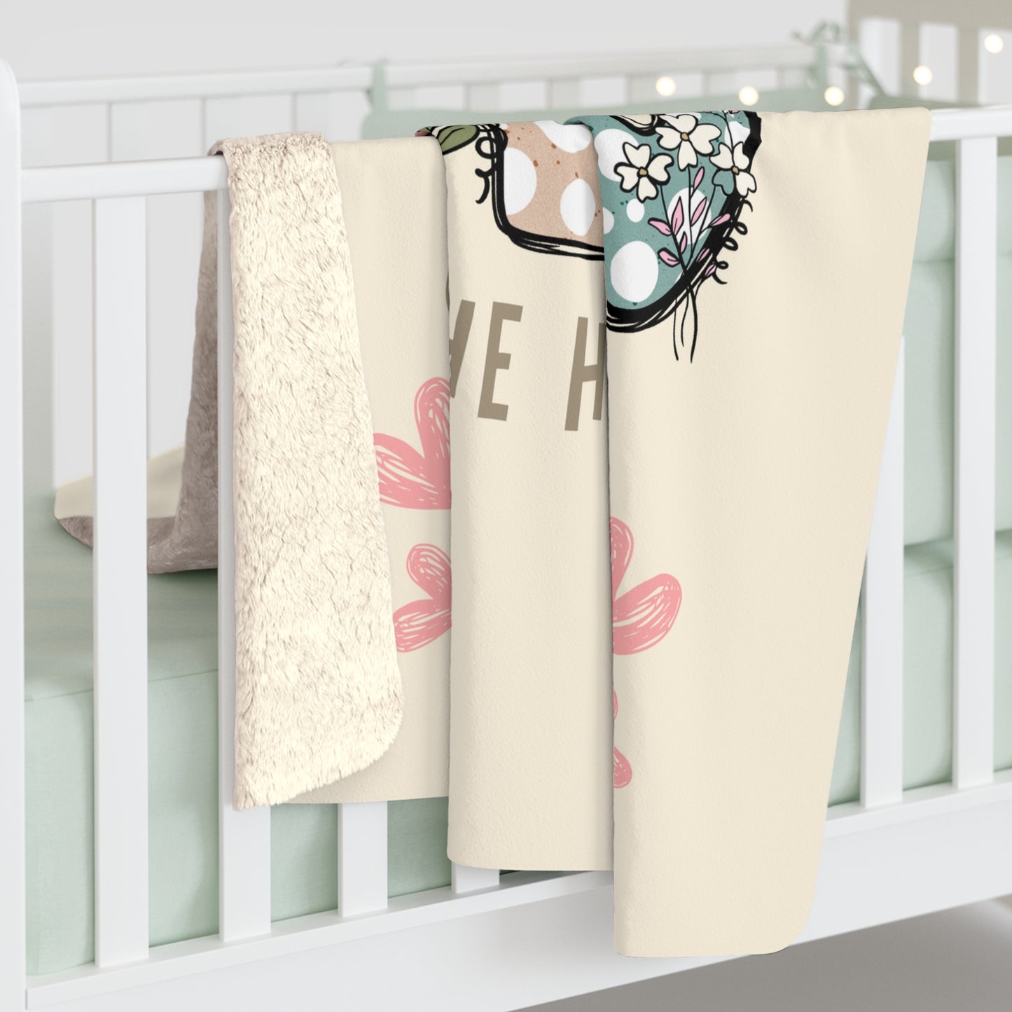 Custom Sherpa fleece blanket with 'CEO of the House' design, featuring playful floral elements, draped over a crib in a cozy nursery setting. Perfect gift for families and couples.