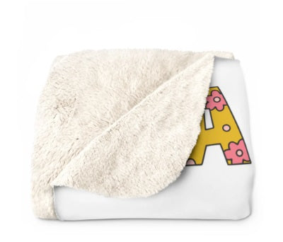 Soft and cozy Sherpa fleece blanket with floral letter design, perfect for personalized home decor or unique gift ideas for couples and families.